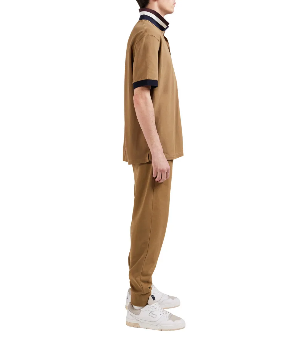 Polo manches courtes Eden Park en coton camel avec des détails bleus marine